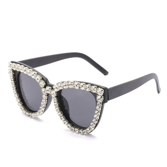 Lunettes de soleil en strass rubis