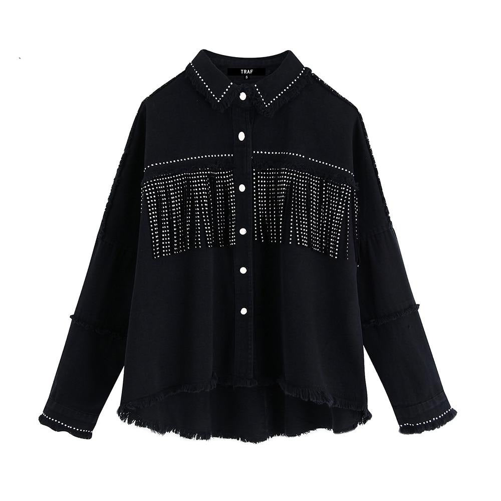 Veste en jean à pompons et perles