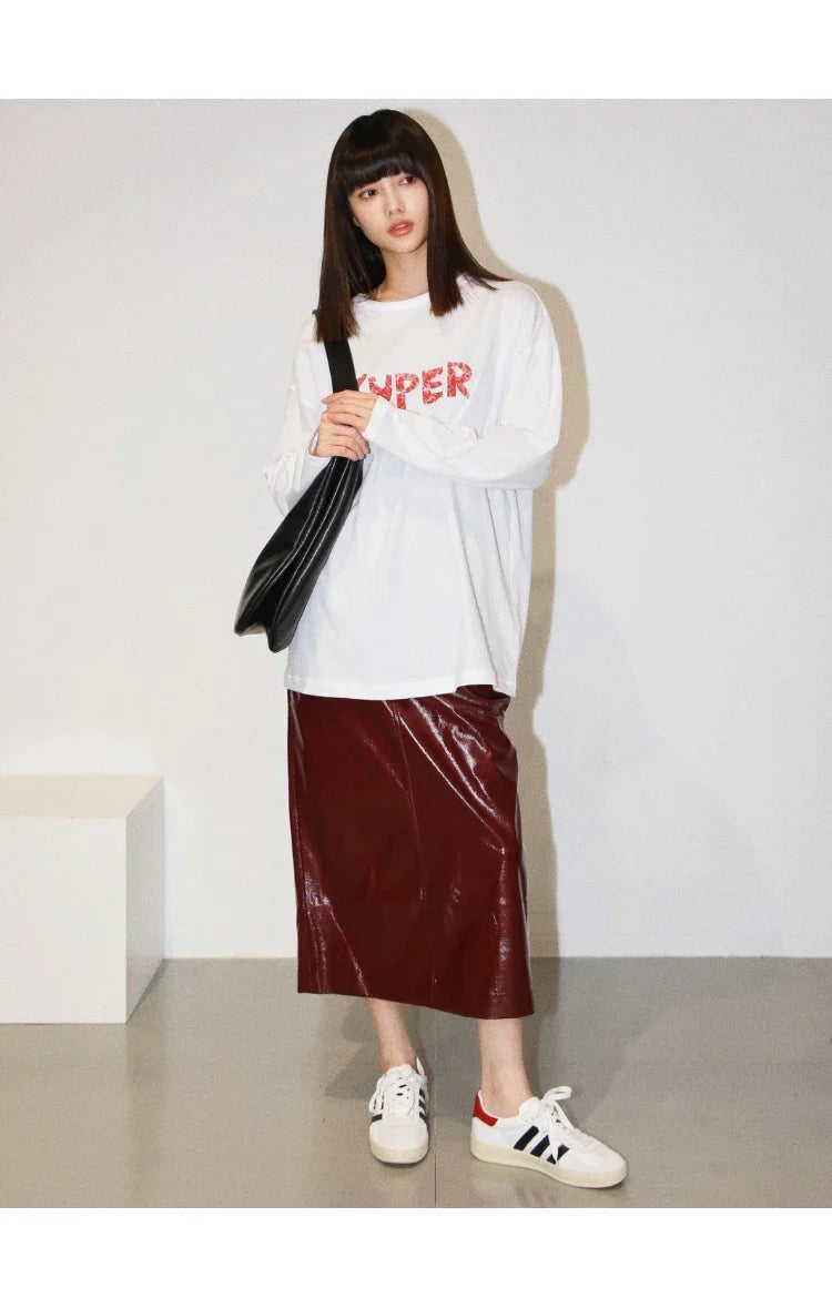 Jupe midi en cuir Aurora